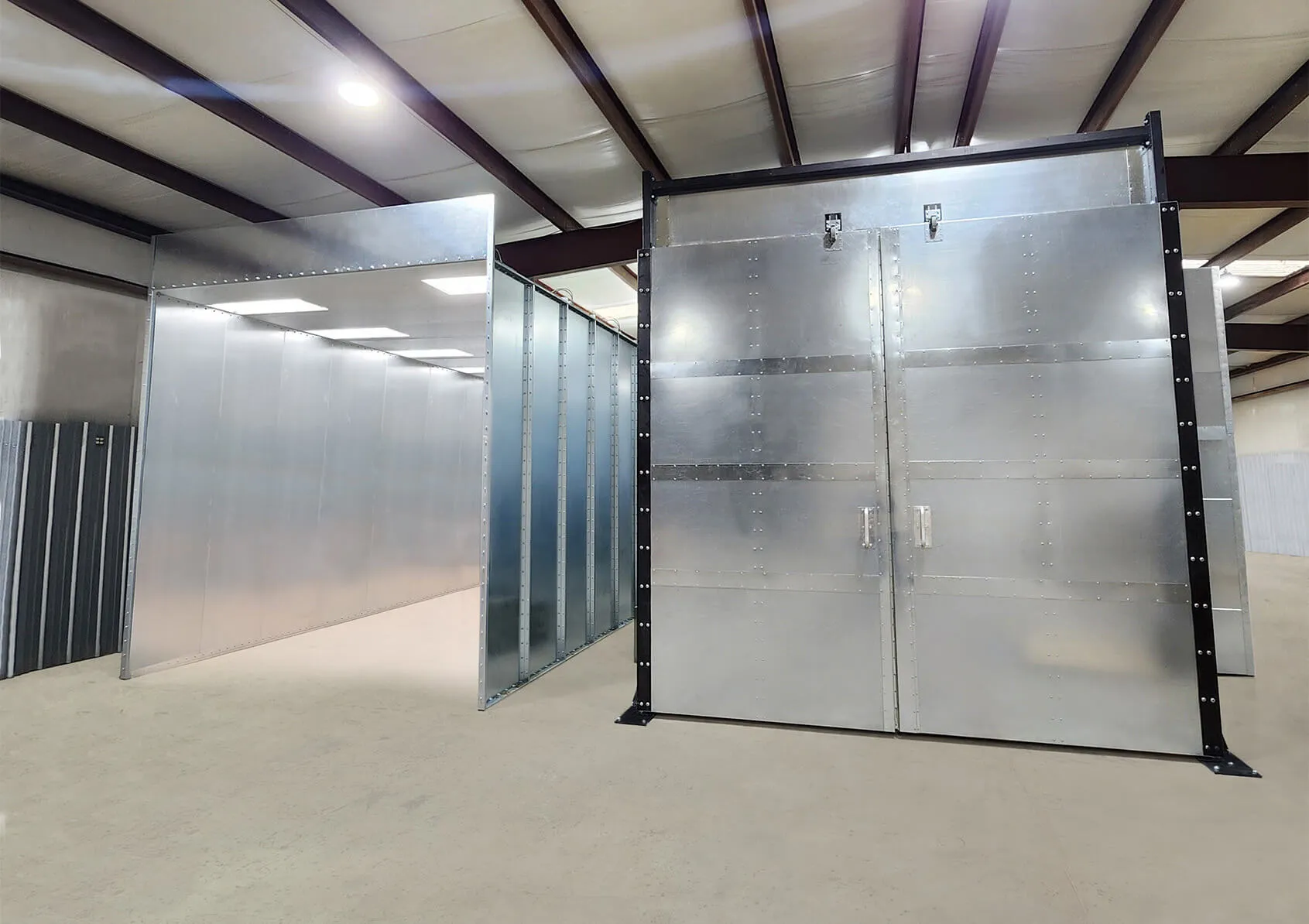 T2 A powder coating spray booth and batch curing oven manufactured by Reliant Finishing Systems